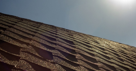 roof beating down on shingle roof